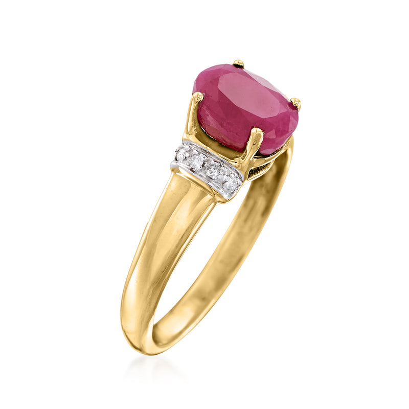 Faceted oval ruby and diamond ring, 14kt yellow gold, side diamond halo