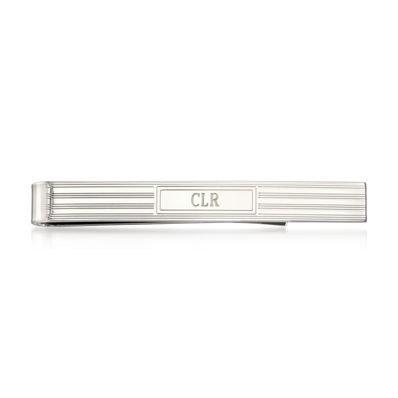 Sterling silver tie bar with horizontal grooves and monogram 'CLR' center plate