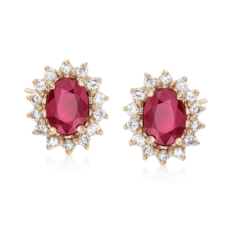 Ruby and diamond stud earrings in 14kt yellow gold, oval ruby haloed by diamonds