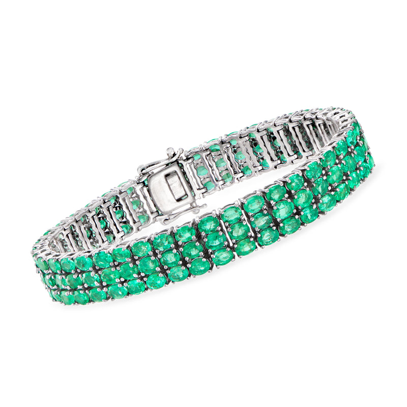 Three-row tennis bracelet with green emerald-style stones, sterling silver setting