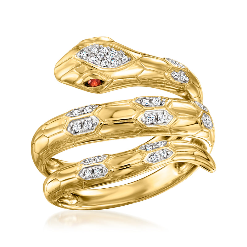 Gold snake wrap ring with oval diamond cluster and red garnet accents, polished bands