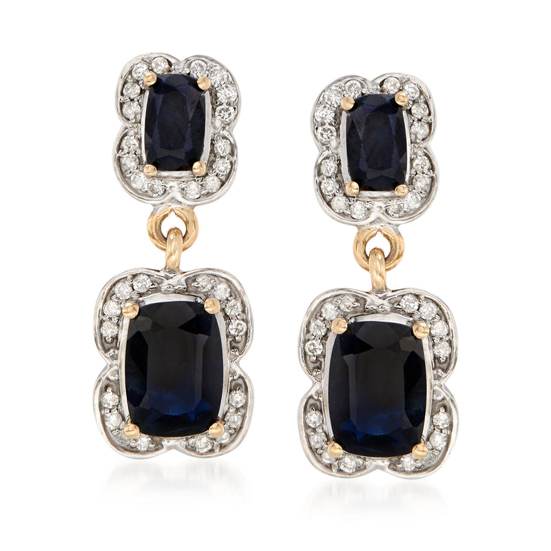Yellow gold drop earrings with dark blue sapphire center and diamond halo drops