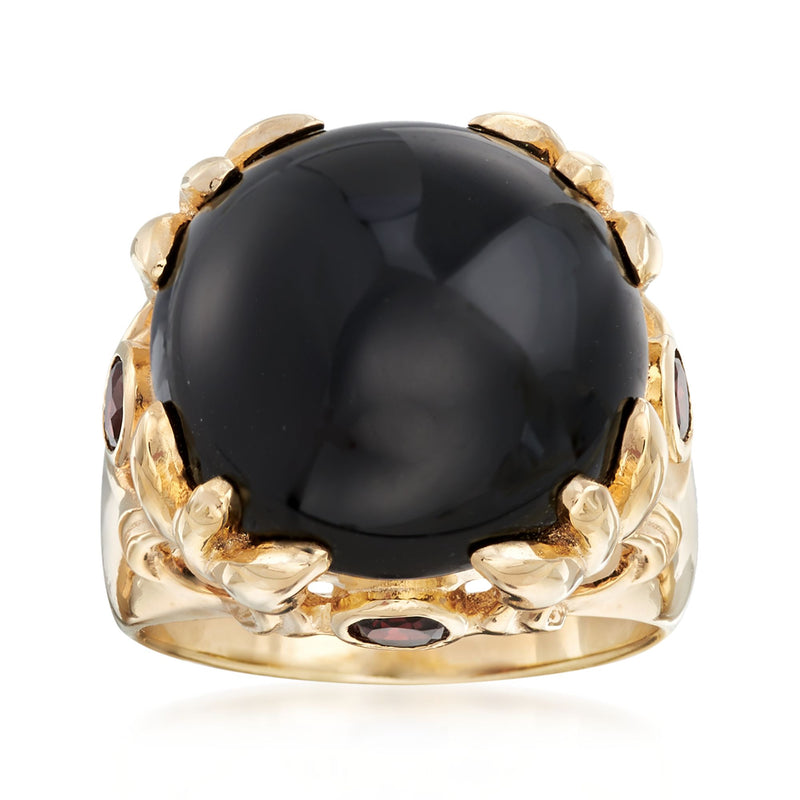 18kt gold over sterling ring with large black onyx cabochon and small garnet accents
