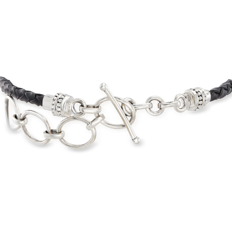 Sterling silver toggle bracelet with black braided leather straps and chain-link clasp hardware