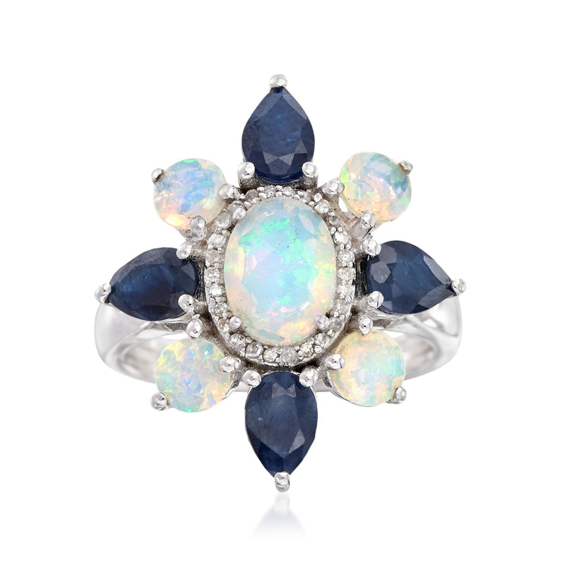 Sterling silver flower ring with oval opal center, dark blue sapphire petals, diamond accents