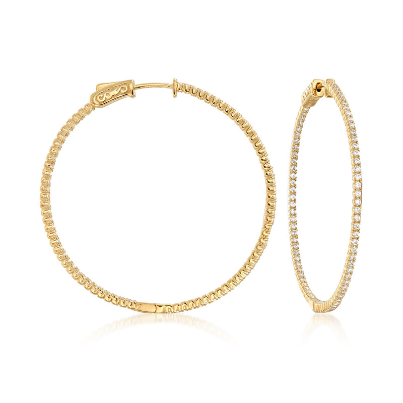 Gold hoop earrings with inside-out CZ accents on the outer edge