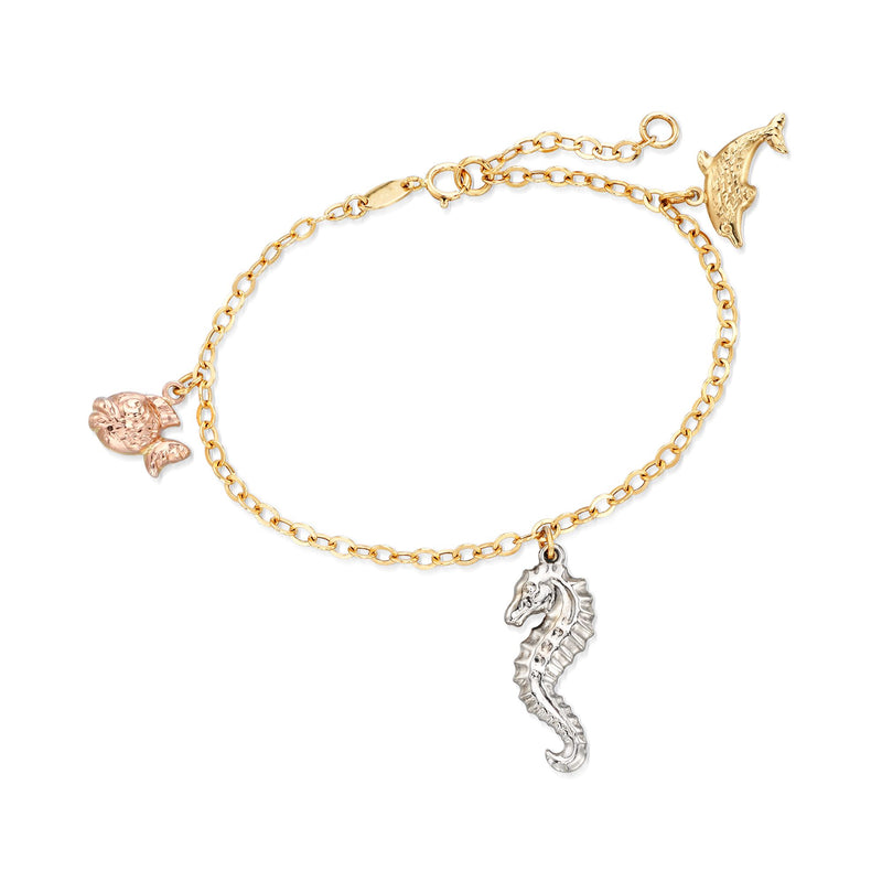 Tri-colored gold charm bracelet with seashell, fish, and seahorse charms
