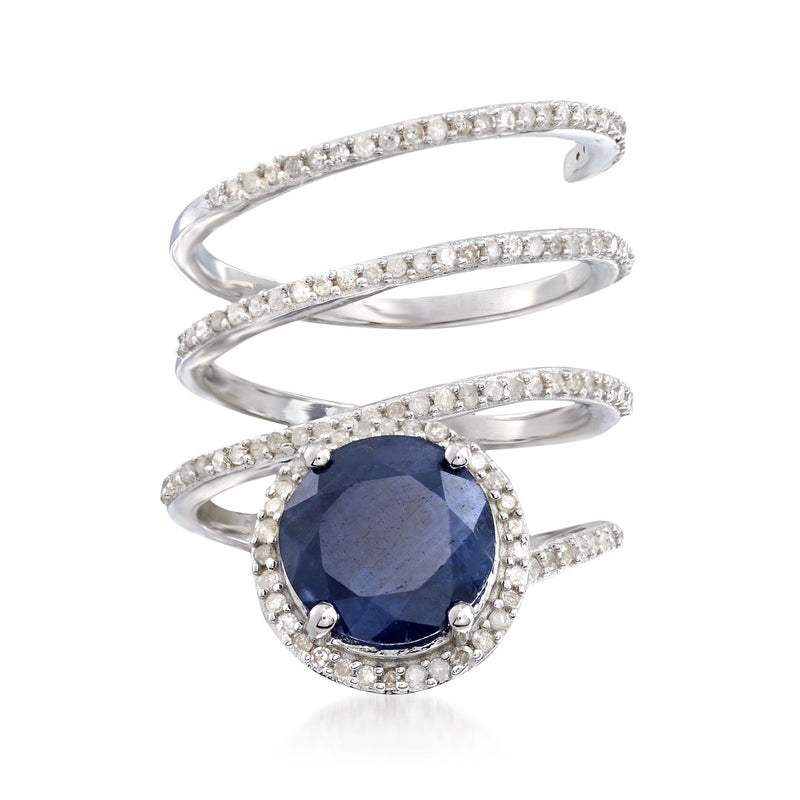 Sterling silver coil ring with round sapphire center and diamond accents