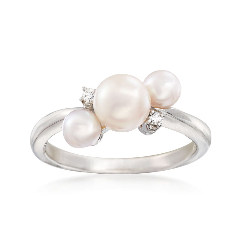 Mikimoto Akoya pearl ring with three white pearls and diamond accents on 18kt white gold band
