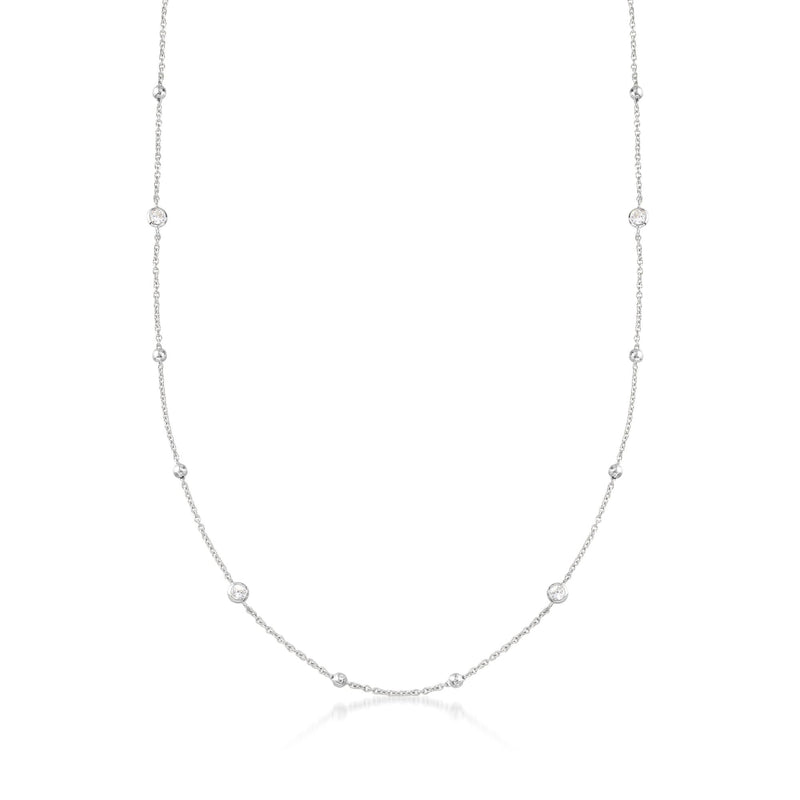Sterling silver station necklace with round bezel-set CZ stones
