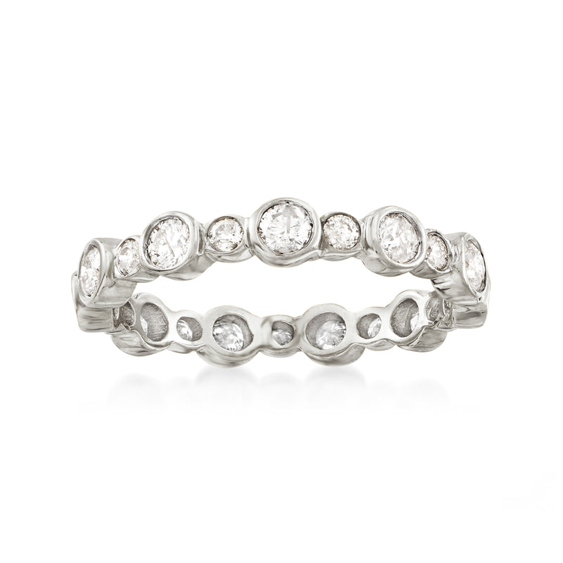 Round diamond eternity band in 14kt white gold, bezel-set circular stones