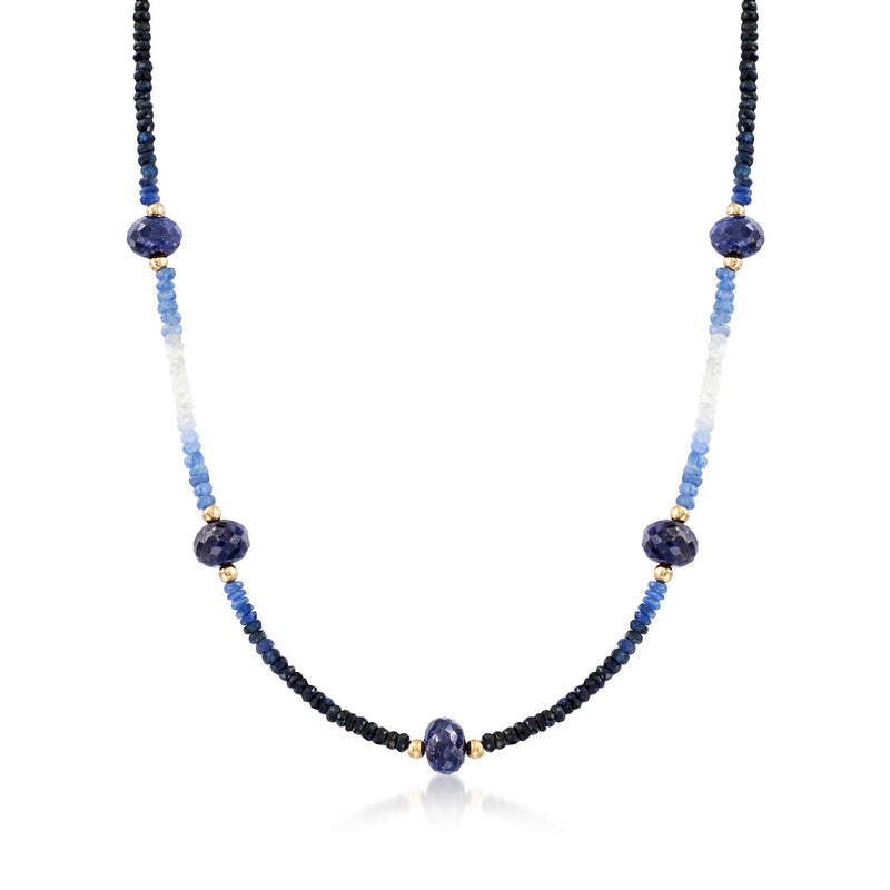 Blue and dark sapphire bead necklace with yellow gold accents, round faceted beads