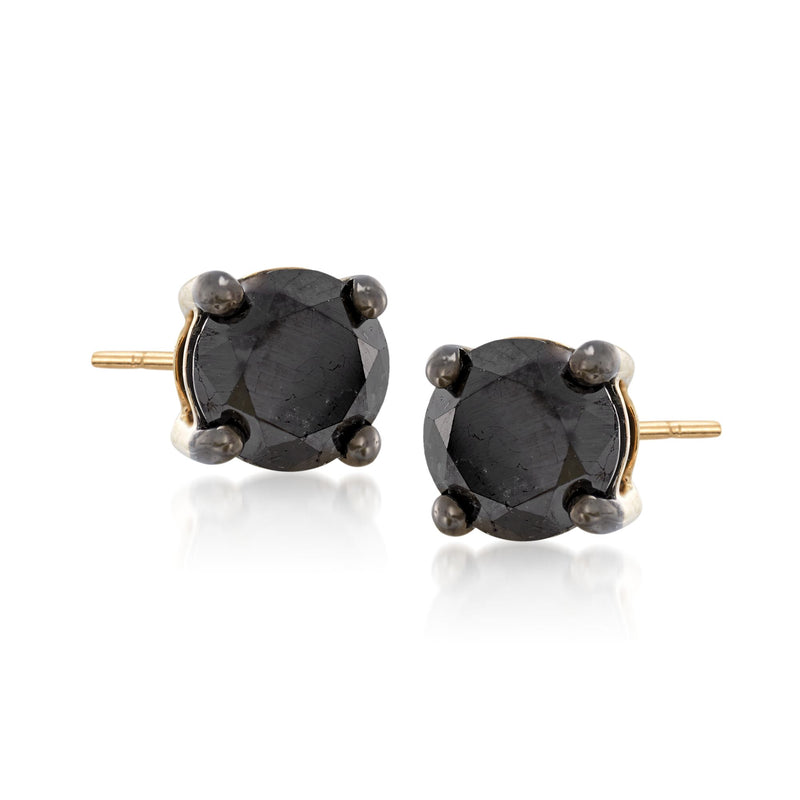 Black diamond stud earrings in 14kt yellow gold with oval, four-prong settings