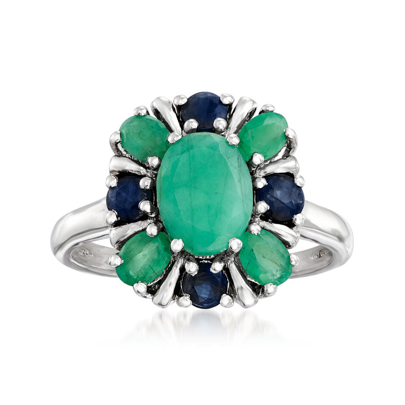 Sterling silver floral ring with oval green gemstone center and blue sapphire accents