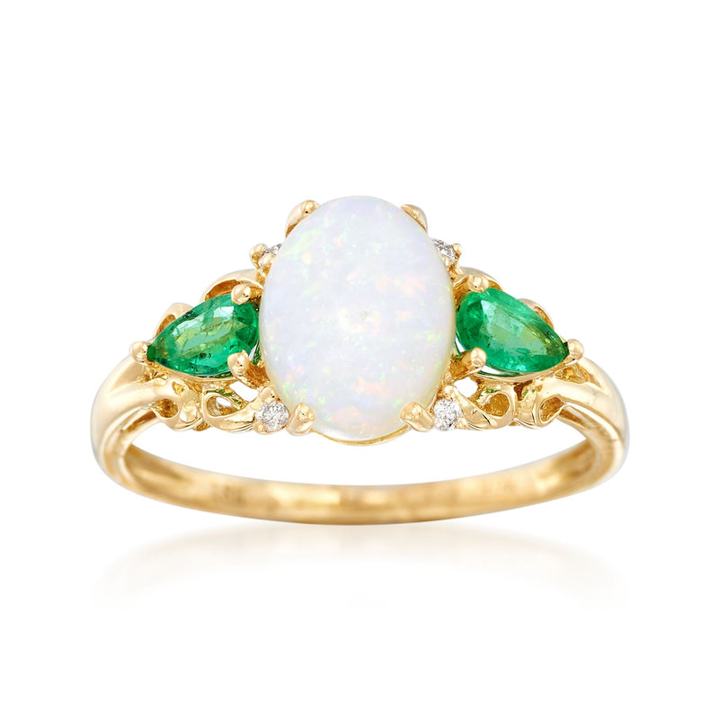 18kt yellow gold opal and emerald ring with oval opal center and diamond accents