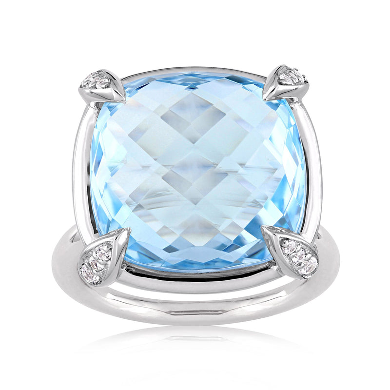 Sky blue topaz and white sapphire halo ring in 14kt white gold, cushion-cut center