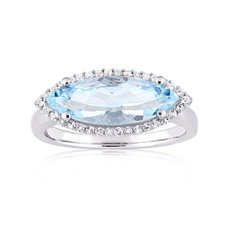 Sterling silver ring with marquise sky-blue topaz center and white topaz halo
