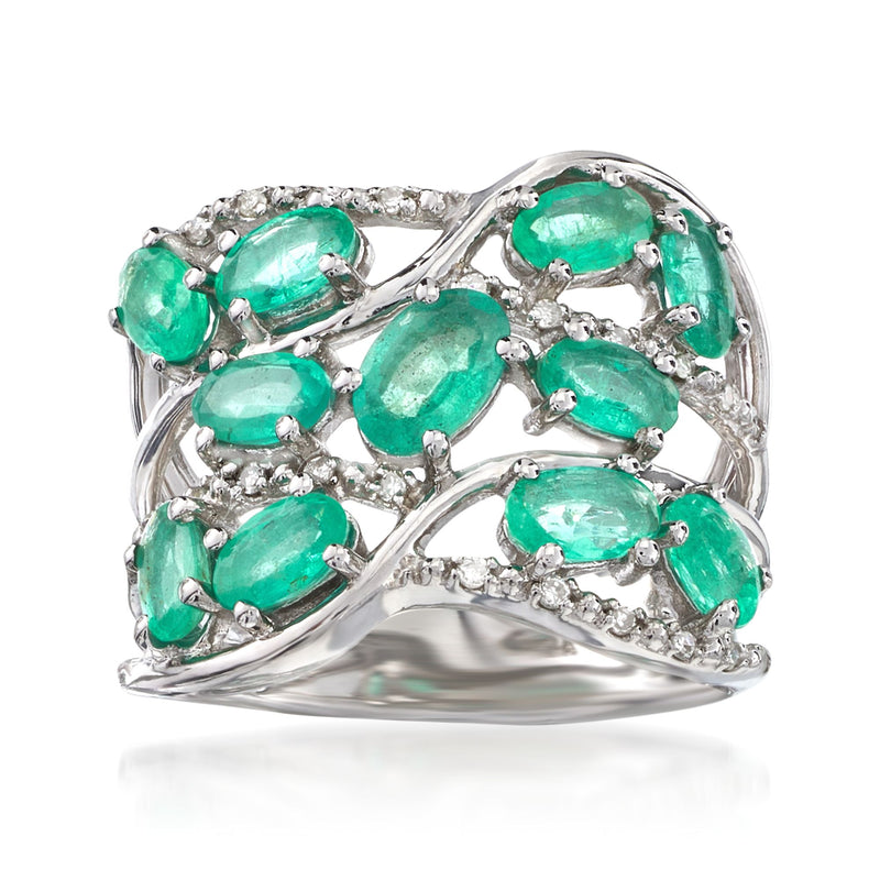 Sterling silver openwork ring with emerald-green oval stones and diamond accents