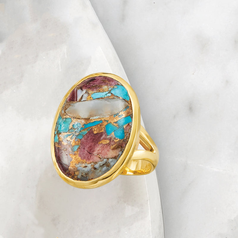Oval turquoise cabochon ring in gold over sterling, teal and marbled red with bezel