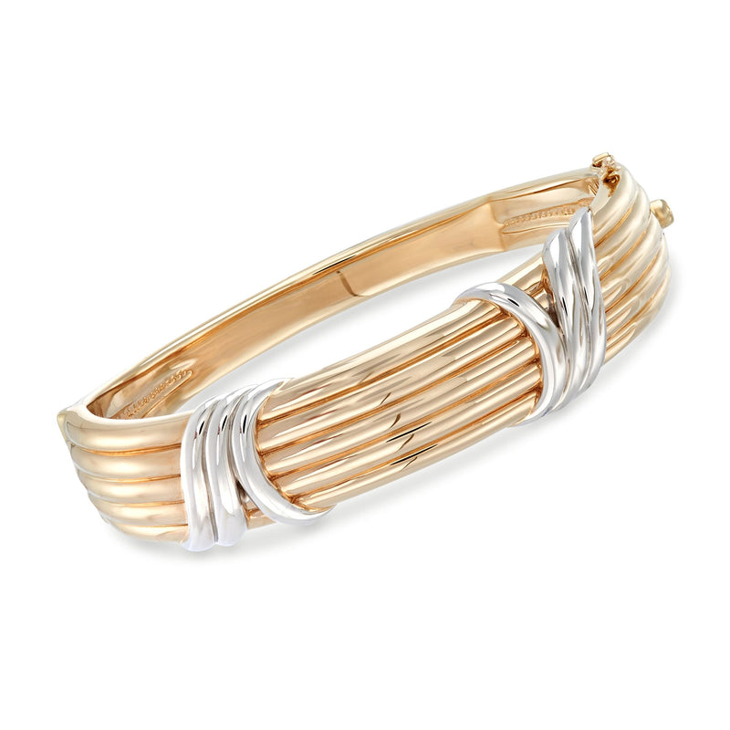 Two-tone 14kt gold ribbed bangle bracelet with smooth hinged cuff ends