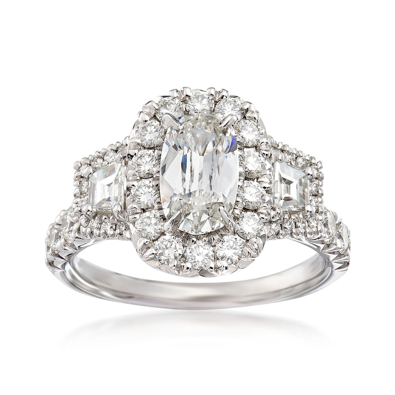 Henri Daussi diamond ring in 18kt white gold with oval center and side stones