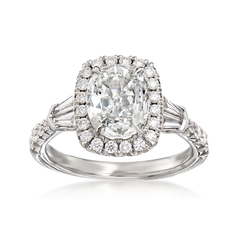 18k white gold diamond engagement ring with cushion-cut center and diamond halo
