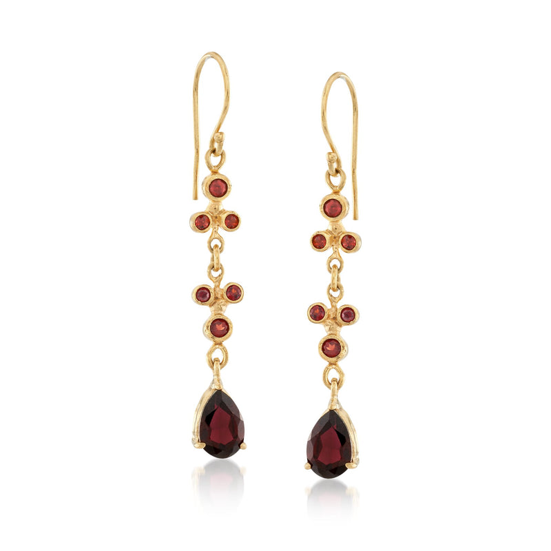 Garnet bezel drop earrings with red round stones and teardrop charm on gold earwire