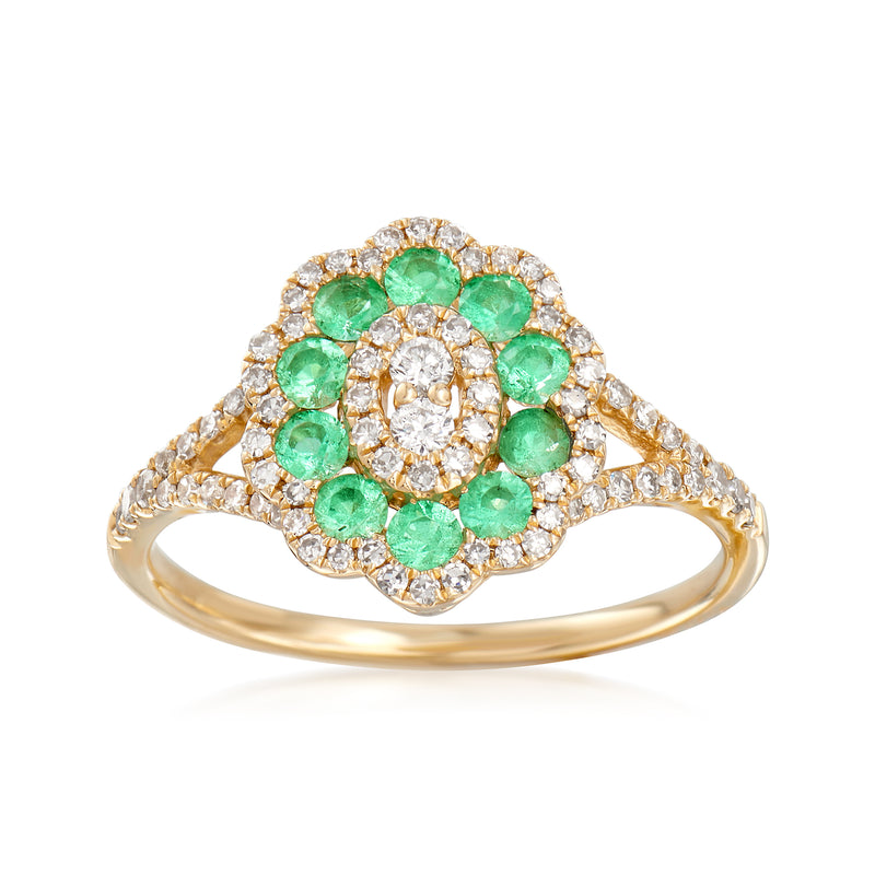 14kt yellow gold ring with oval emerald center and diamond halo