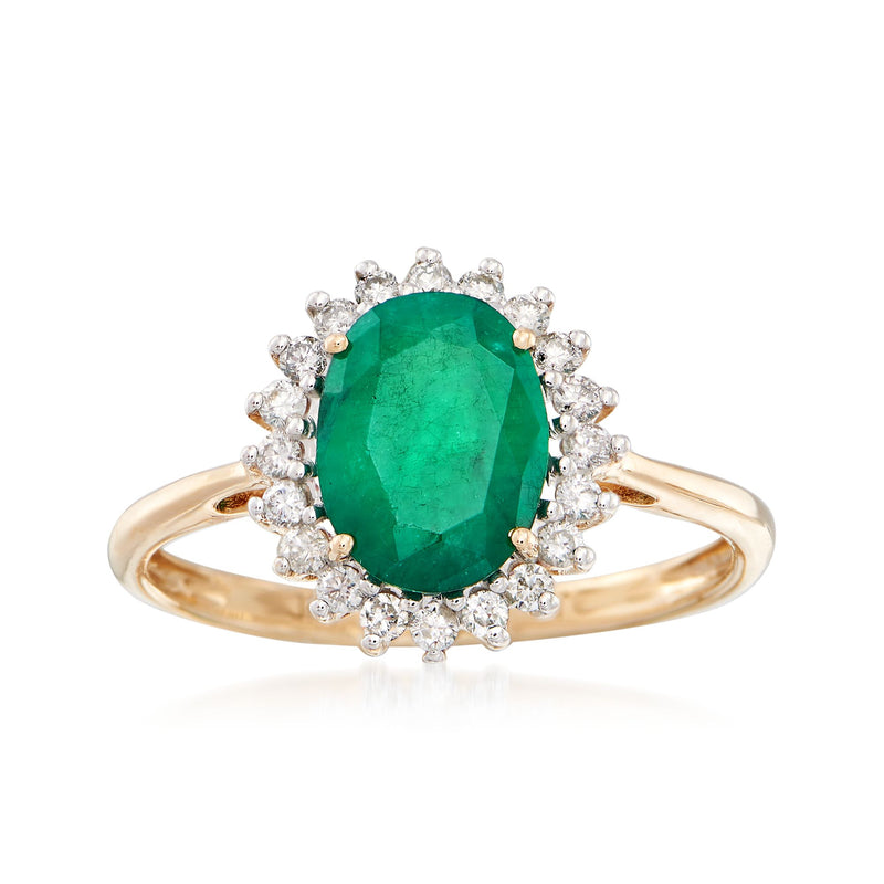 14kt yellow gold ring with oval emerald-green gemstone and diamond halo