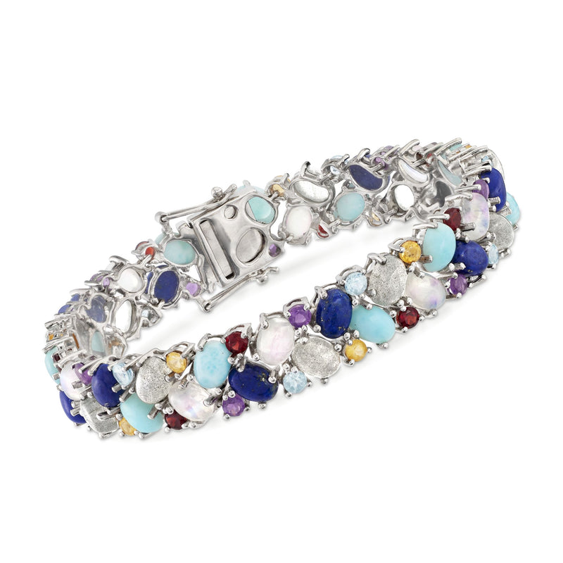 Sterling silver multi-stone bracelet with blue, purple, turquoise, red, and white gems
