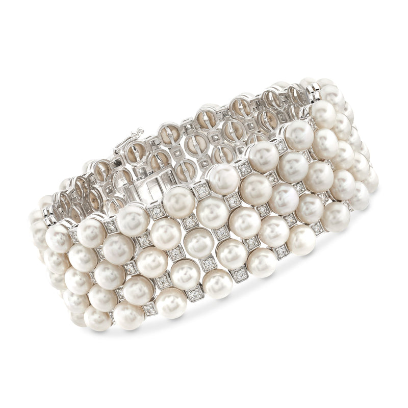 Sterling silver bracelet with cultured white pearls and clear topaz-like stones