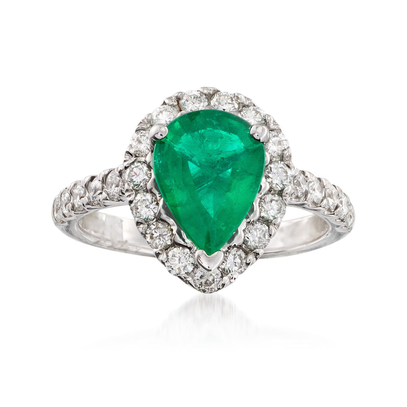 14kt white gold ring with pear-cut green gemstone and diamond halo