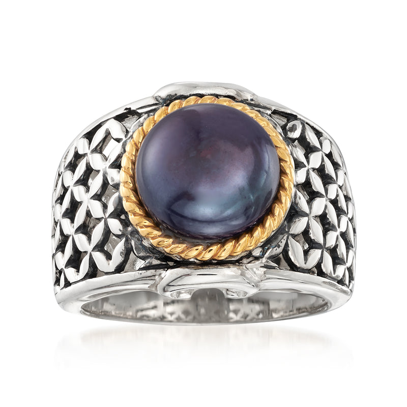 Two-tone sterling silver ring with black button pearl and textured bezel, gold-toned rim.