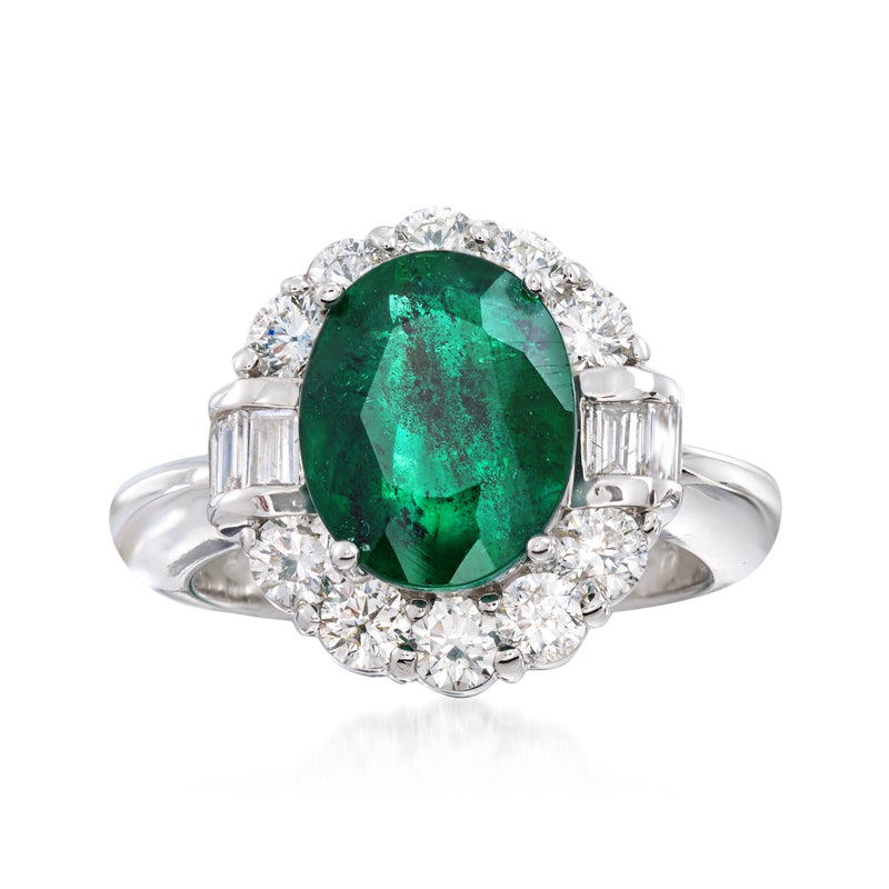 14kt white gold ring with oval green emerald-cut center and diamond halo