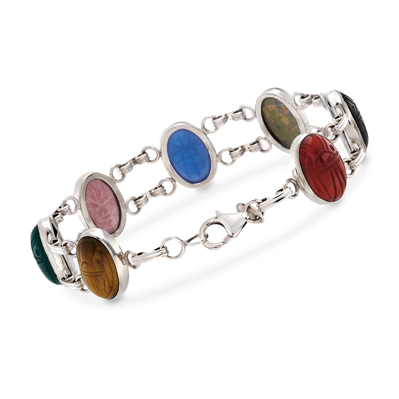 Sterling silver bracelet with oval cabochons in blue, red, green, and dark tones