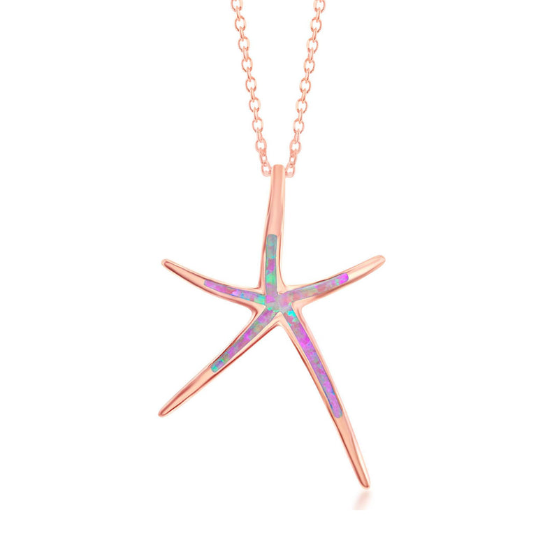 Rose gold starfish pendant necklace with pink opal-style iridescent inlay