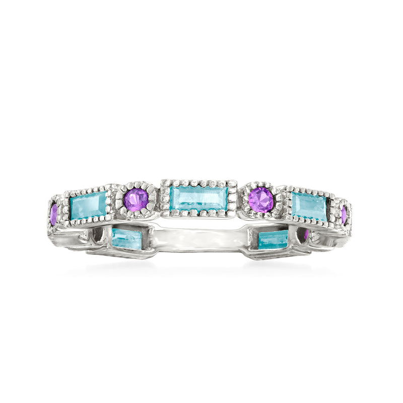 Sterling silver ring with sky blue topaz and rhodolite garnets, prong-set