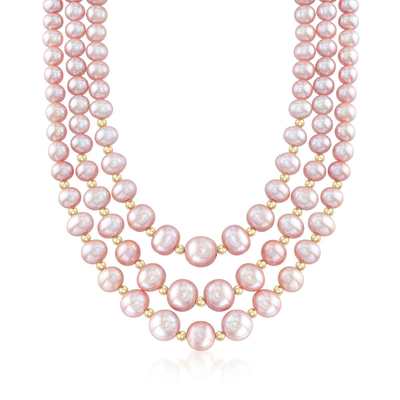 Three-strand pink cultured pearl necklace with 14kt yellow gold bead accents