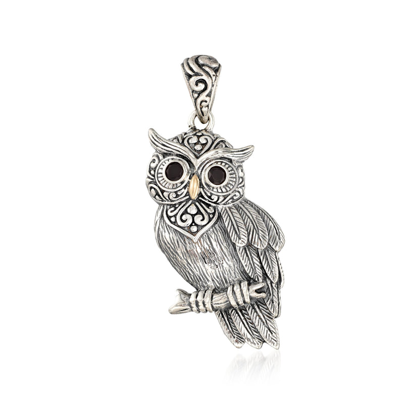 Sterling silver owl pendant with detailed wings and black onyx eyes, hanging bail loop