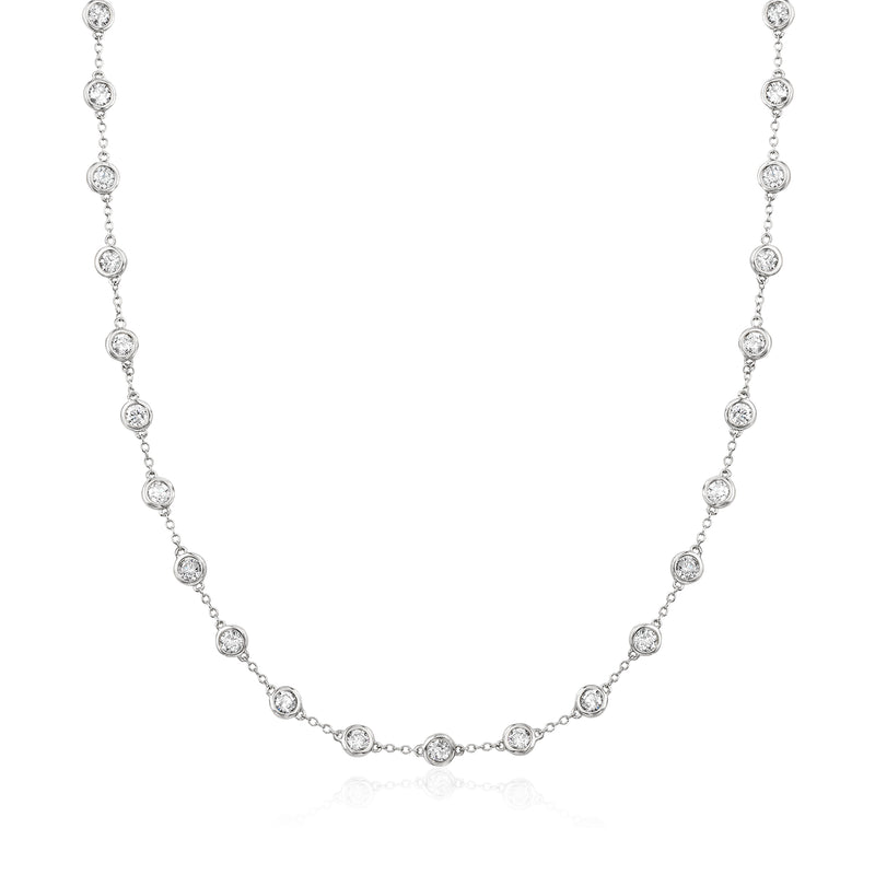 Diamond station necklace with bezel-set round diamonds on 14kt white gold chain