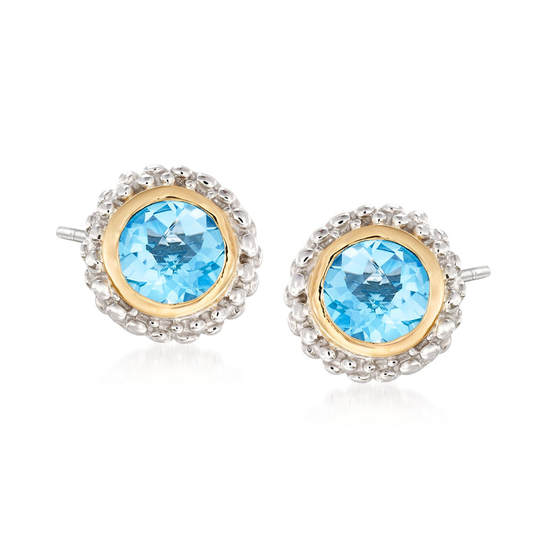 Blue topaz stud earrings in sterling silver with 18kt yellow gold bezel and posts
