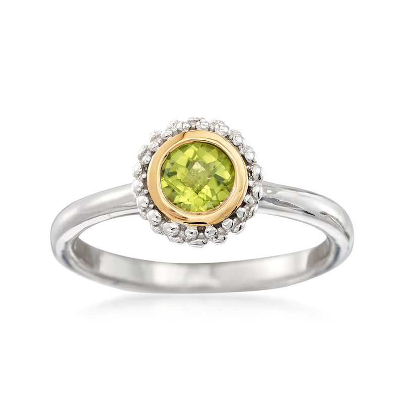Sterling silver peridot ring with 18kt gold bezel and diamond halo