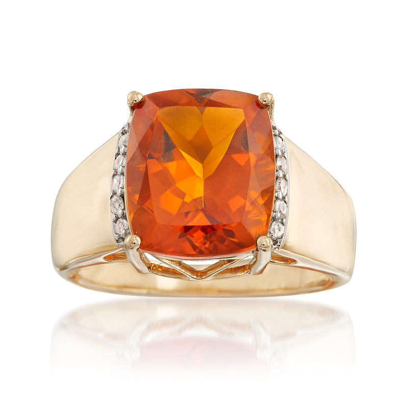 14kt yellow gold ring with large orange citrine center and diamond side accents