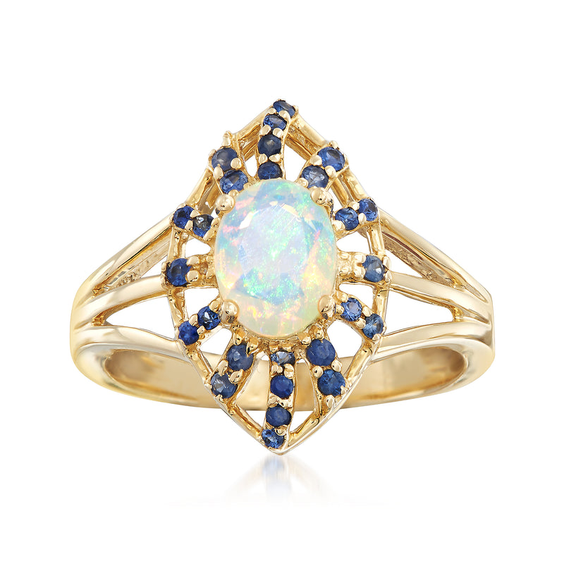 Opal and sapphire ring in 14kt yellow gold, oval opal center with blue sapphire halo