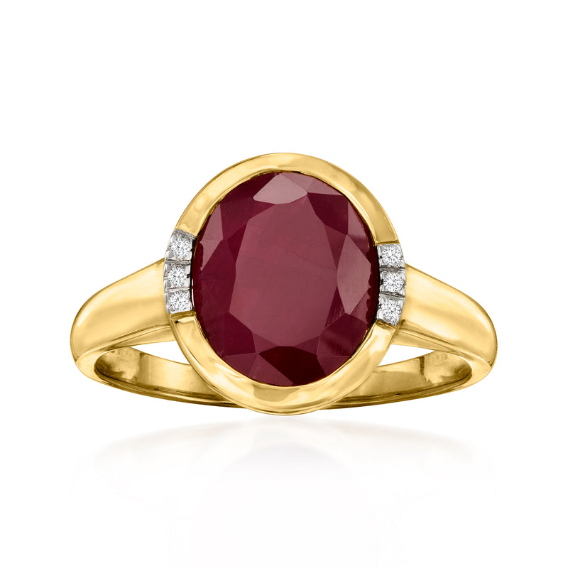 Oval ruby and diamond ring in 14kt yellow gold, oval red center stone