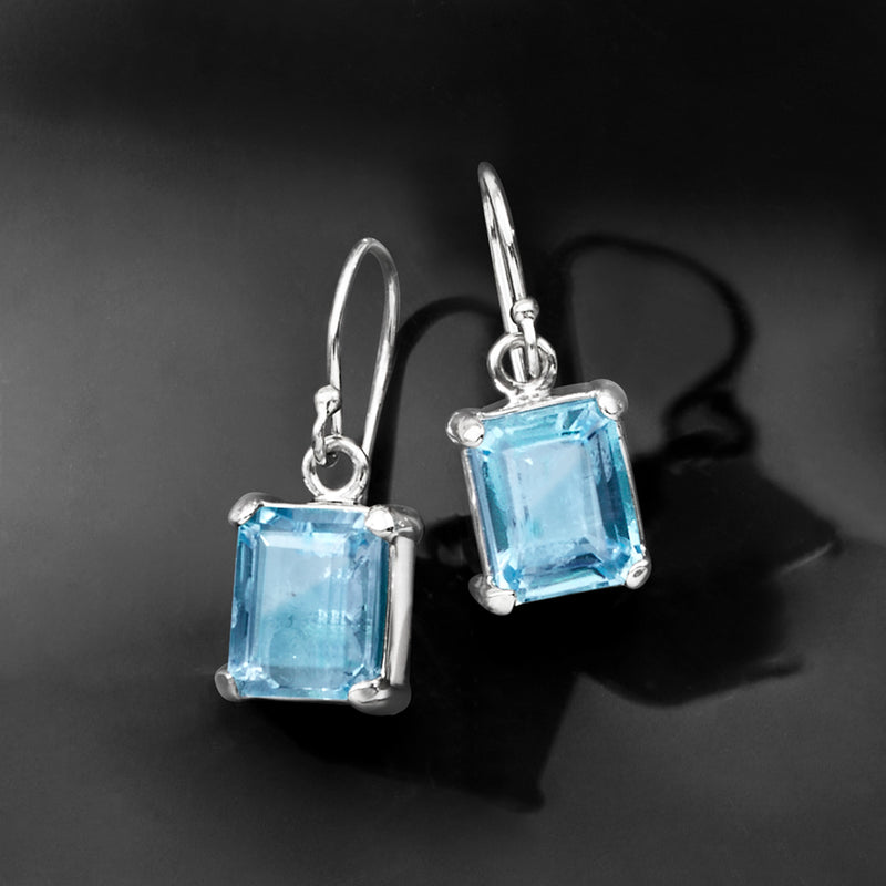 Sterling silver drop earrings with sky blue square-cut topaz and dangling earwires
