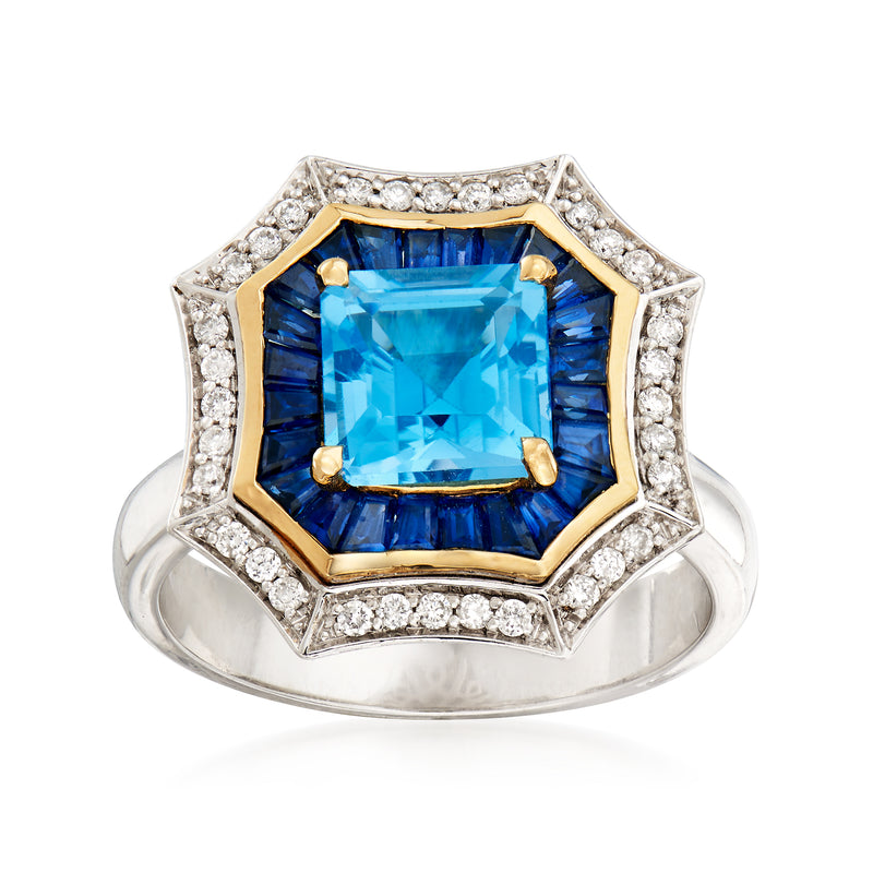 Two-tone gold multi-stone ring with a large blue square-cut center gemstone and halo