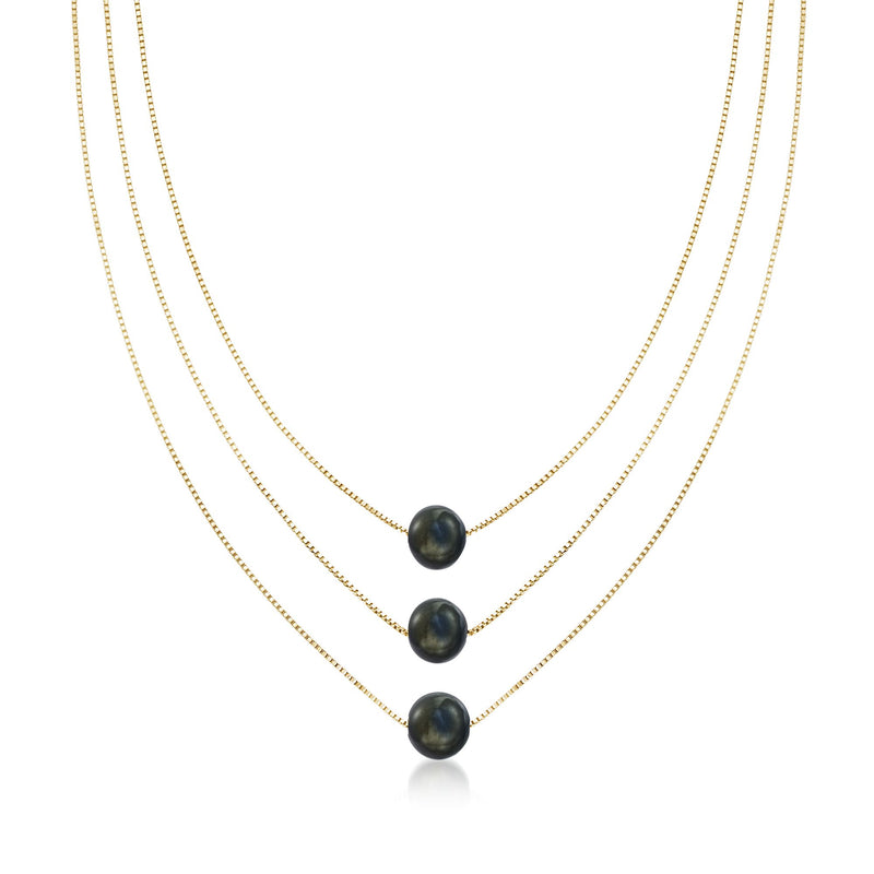Three-strand necklace with black cultured pearls in 18kt yellow gold