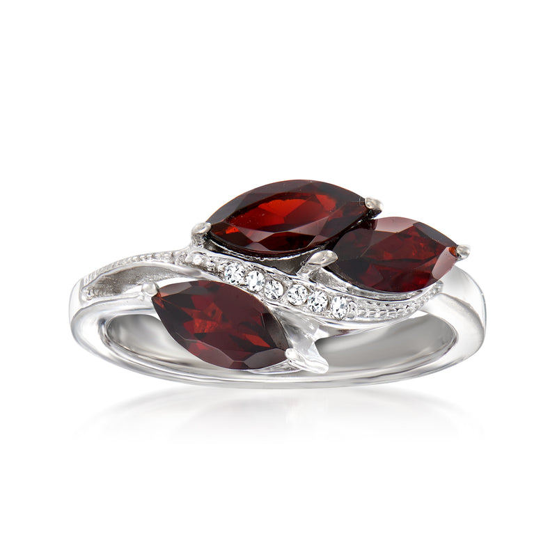 Sterling silver garnet ring with three marquise stones and white topaz accents