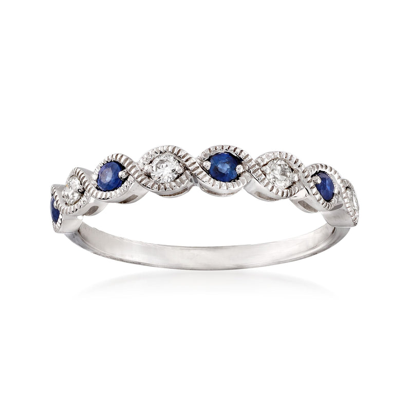 14kt white gold twist ring with milgrain, blue sapphires and round diamond accents